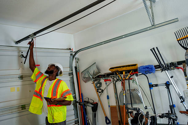 Professional Garage Door Panel Replacement technician working in Teton County County, ID